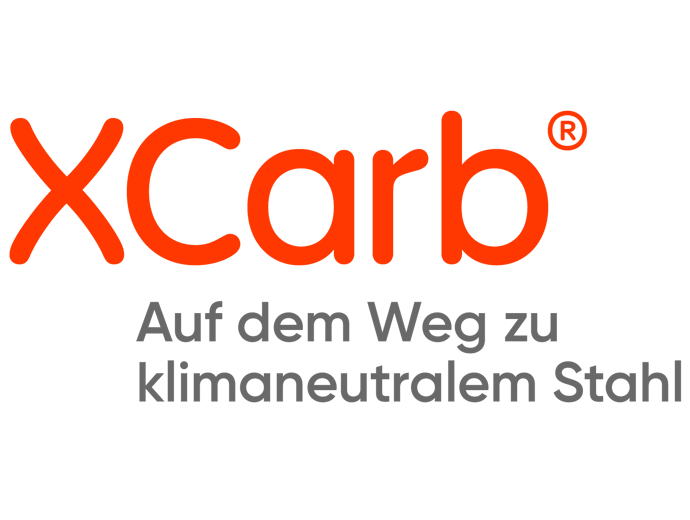 AM XCarb_Logo_R_Towards_DE_RGB_Pos.png